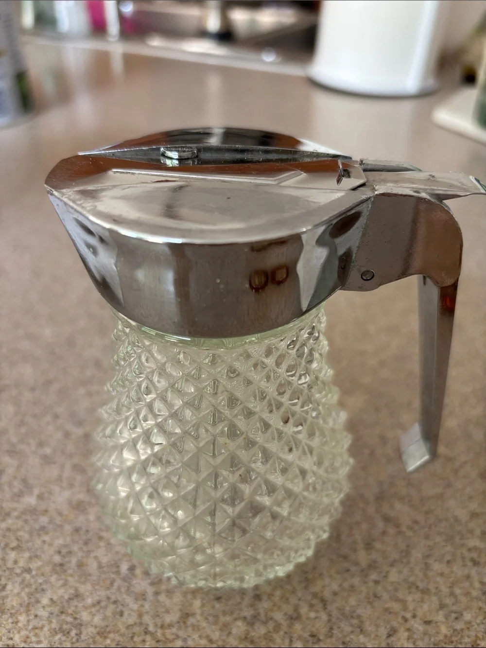 Clear Glass Honey Dispenser with Silver Metal Lid and Handle